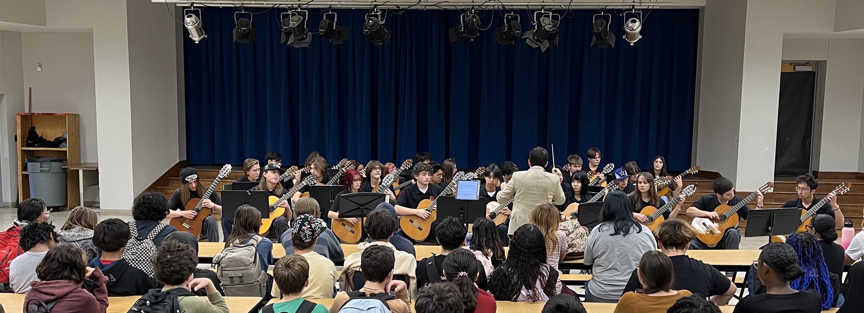 Sahuaro guitar ensemble performing for Magee students