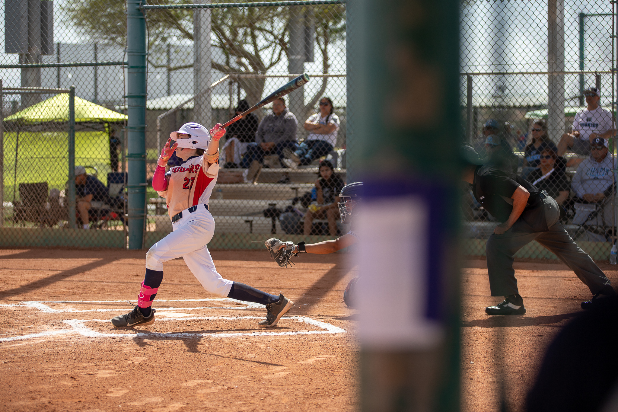 A Sahuaro player swings the bat