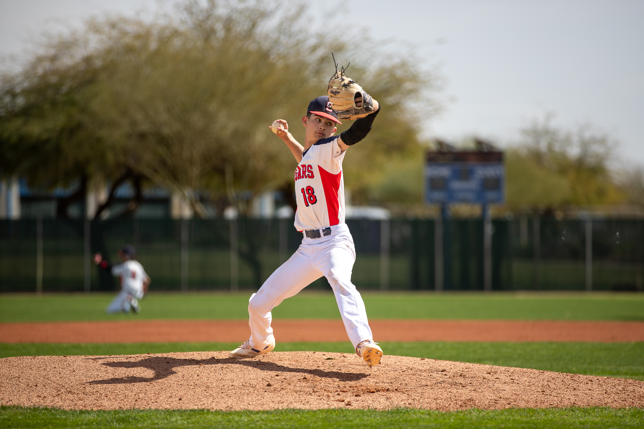 Sahuaro's pitcher throws out the ball from the mound